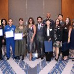 : Members of Kheir Clinic’s Board of Directors, along with the CEO, legislative staff, and event honorees, stand together for a group photo.
