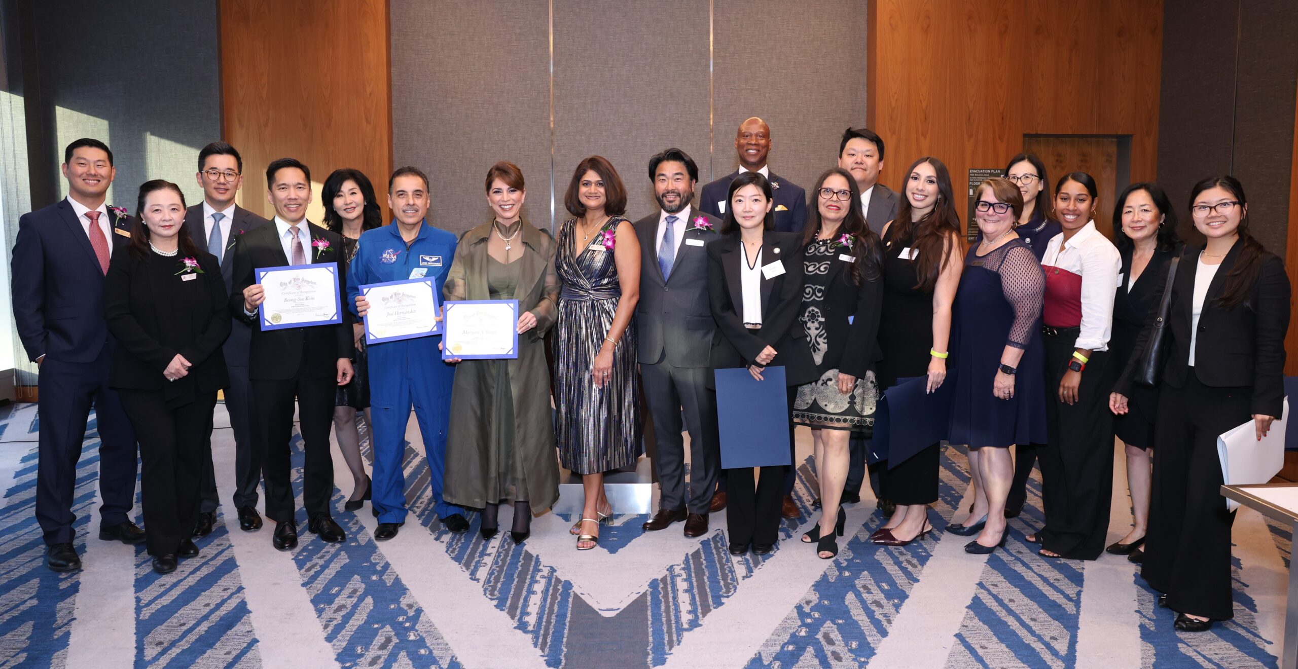 : Members of Kheir Clinic’s Board of Directors, along with the CEO, legislative staff, and event honorees, stand together for a group photo.