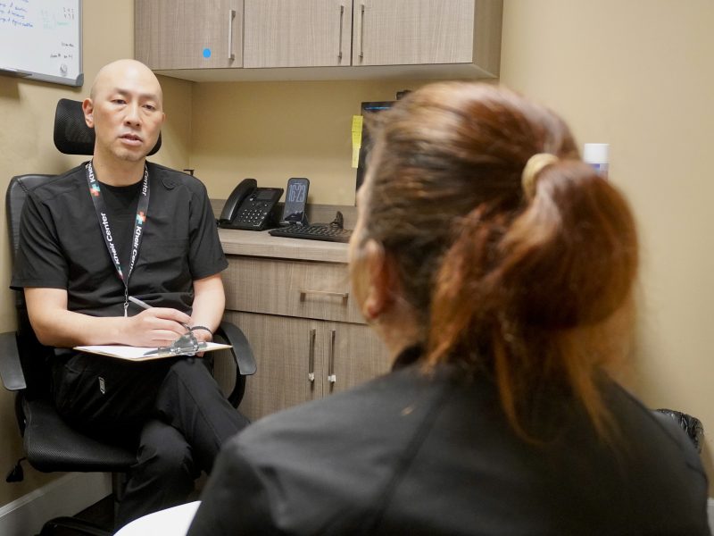 Licensed therapist meeting one-on-one with a patient during an individual counseling session at Kheir Clinic