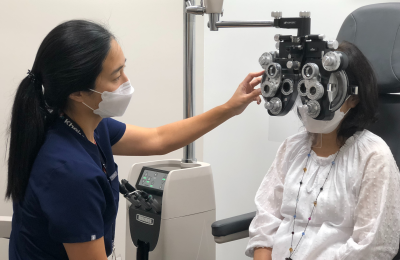 Dr. Hur, Optometrist, with patient