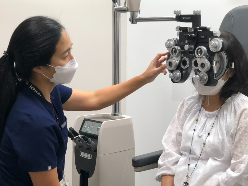 Dr. Hur, Optometrist, with patient