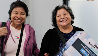 Two participants smiling